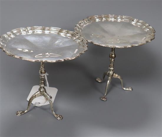A pair of George V silver miniature occasional tables with piecrust borders, Mappin & Webb, Sheffield, 1925, height 97mm.